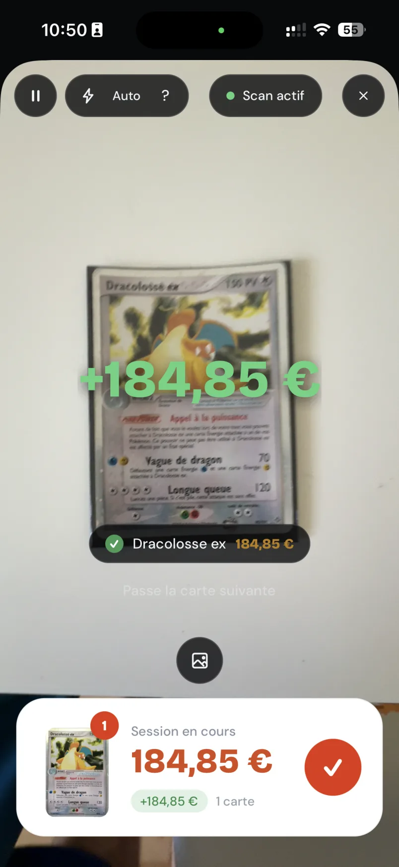 The Mintdex scanner screen: a card in the viewfinder, recognised with its price